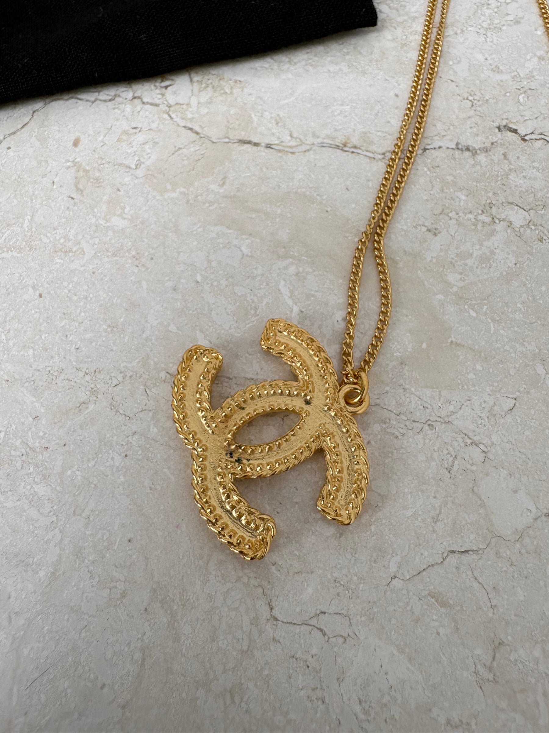 Chanel Gold Tone CC Pendant Necklace