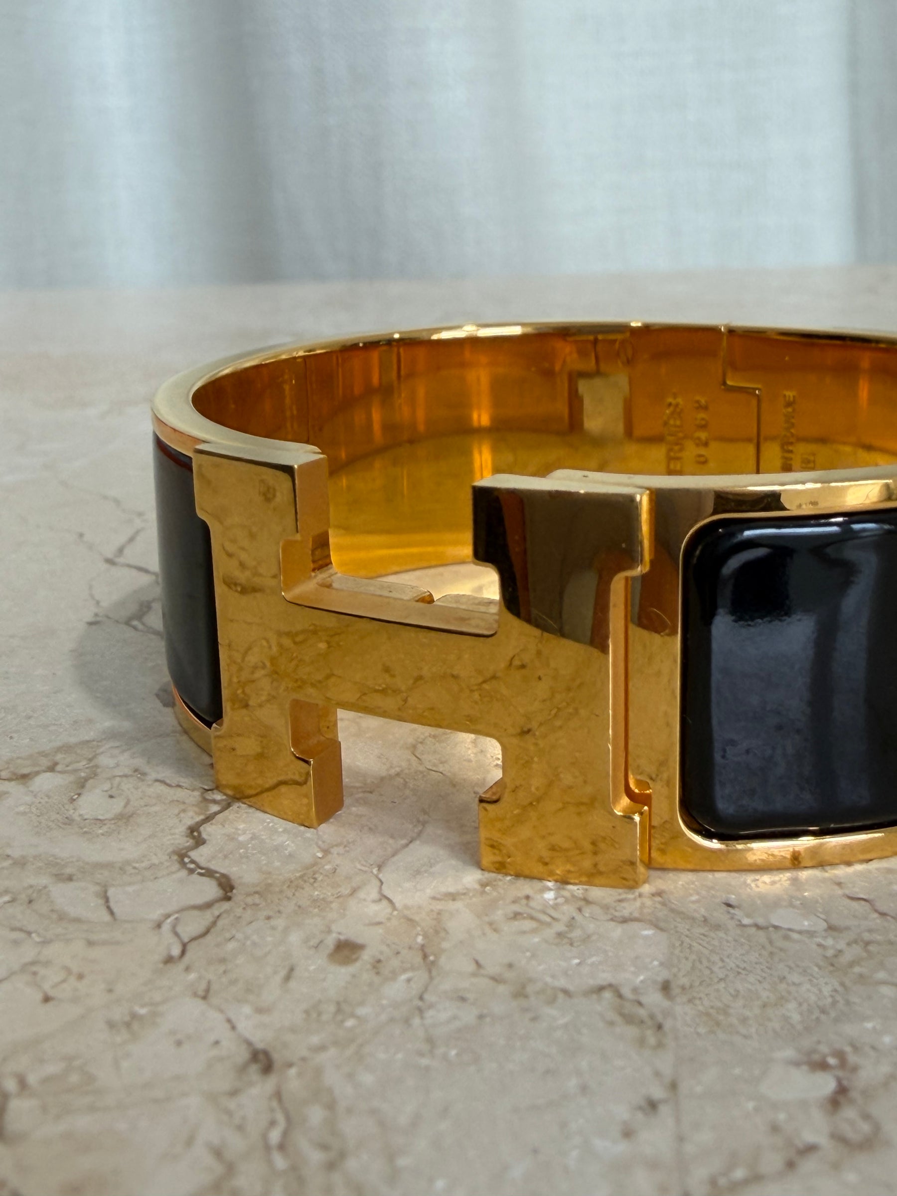 Hermès Clic H Wide Black With Yellow Gold, PM