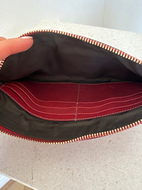 Gucci Red Monogram Embossed leather Wristlet Pouch