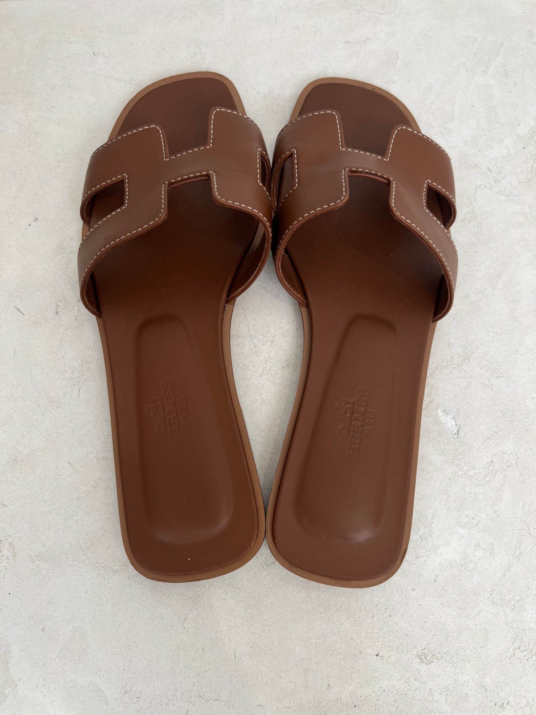 Hermès Gold Leather Oran Sandals, 36