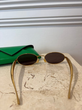 Bottega Veneta Gold Sardine Oval Sunglasses