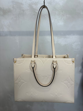 Louis Vuitton Cream Empreinte Leather On the Go MM Tote