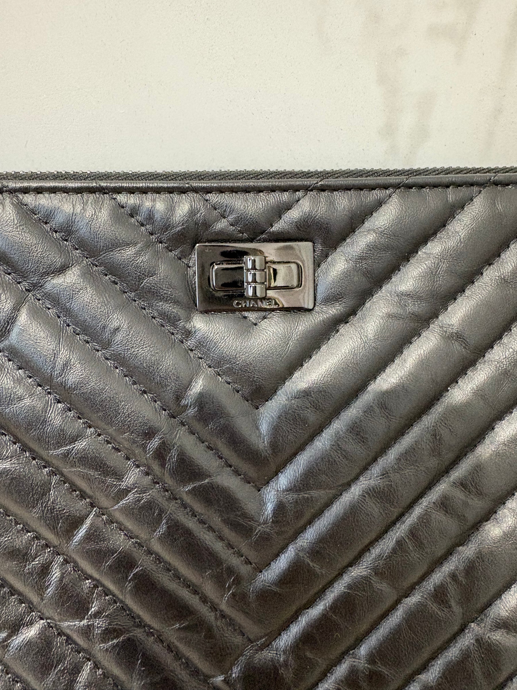 Chanel Black Chevron Quilted Leather Reissue O Case