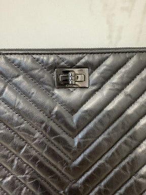 Chanel Black Chevron Quilted Leather Reissue O Case