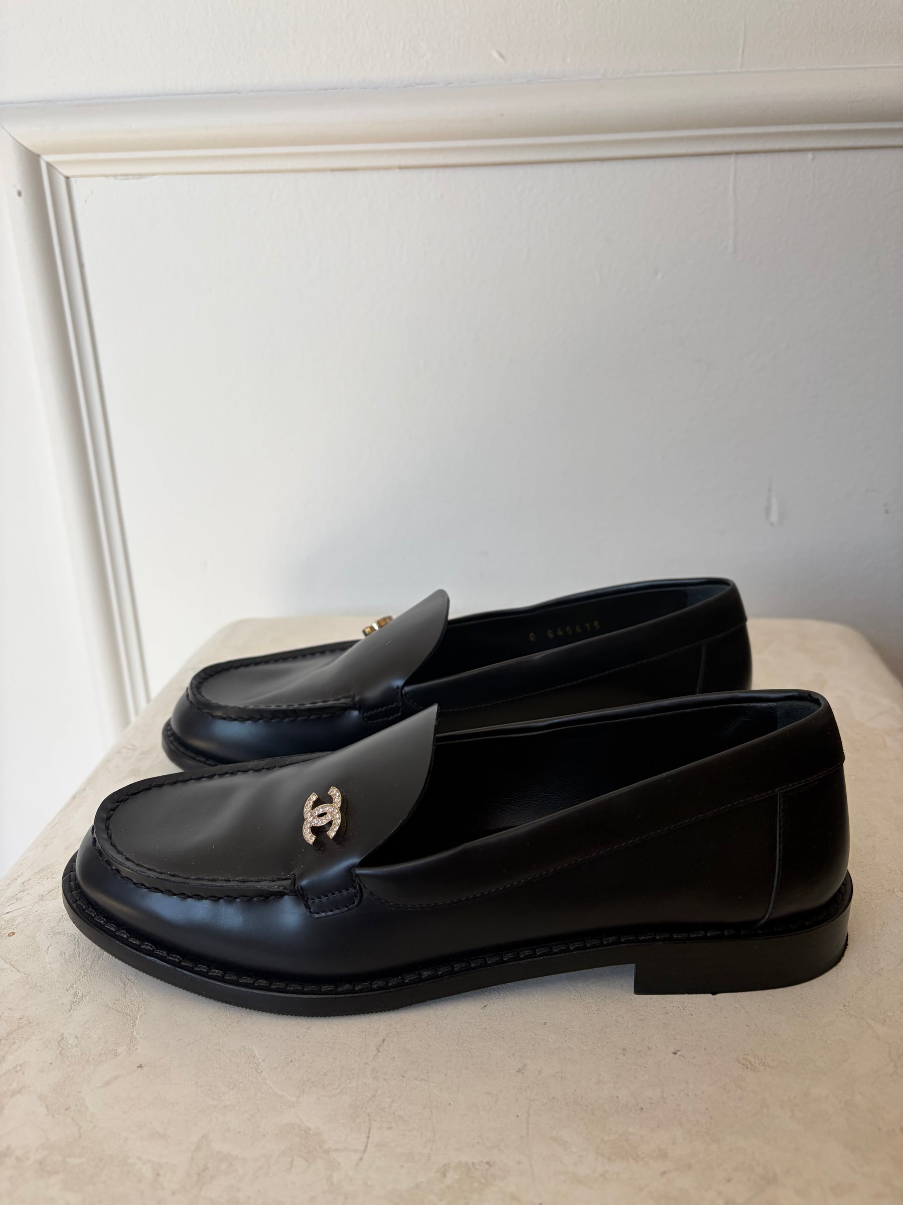 Chanel Black Leather Crystal Logo Loafer, 36.5C