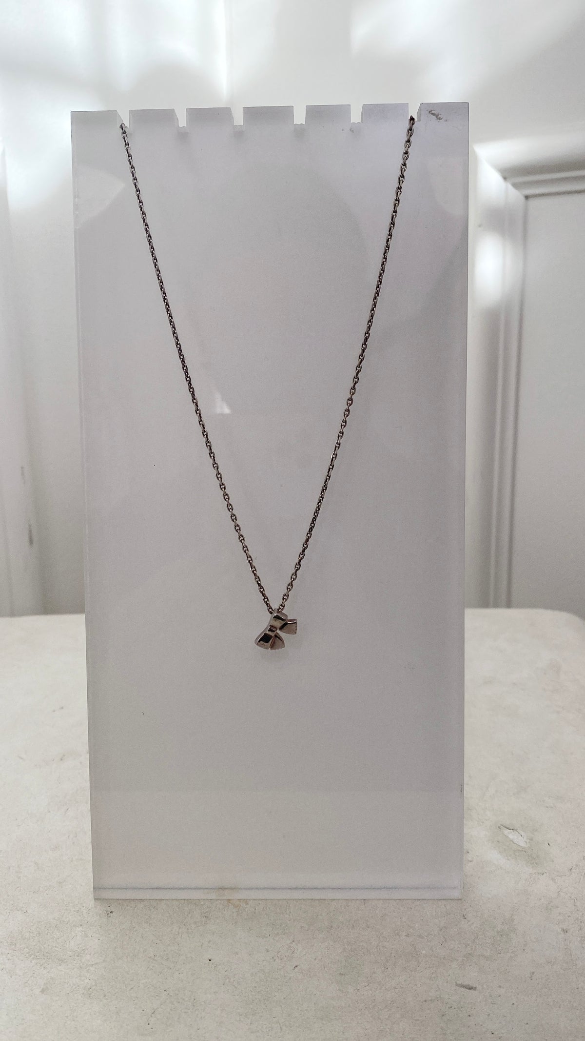 Chanel Silver Bow Pendant Necklace