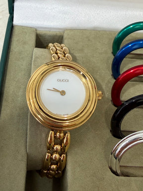 Gucci Gold Tone Interchangeable Bezel Watch