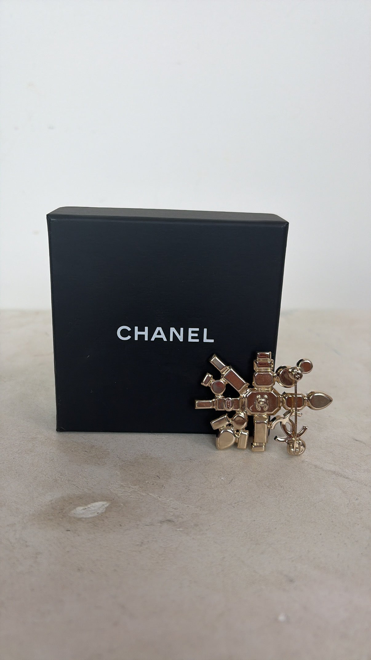 Chanel Champagne Crystal Logo Brooch