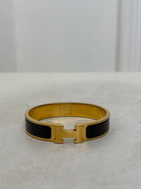 Hermès Black and Gold Clic H Bracelet