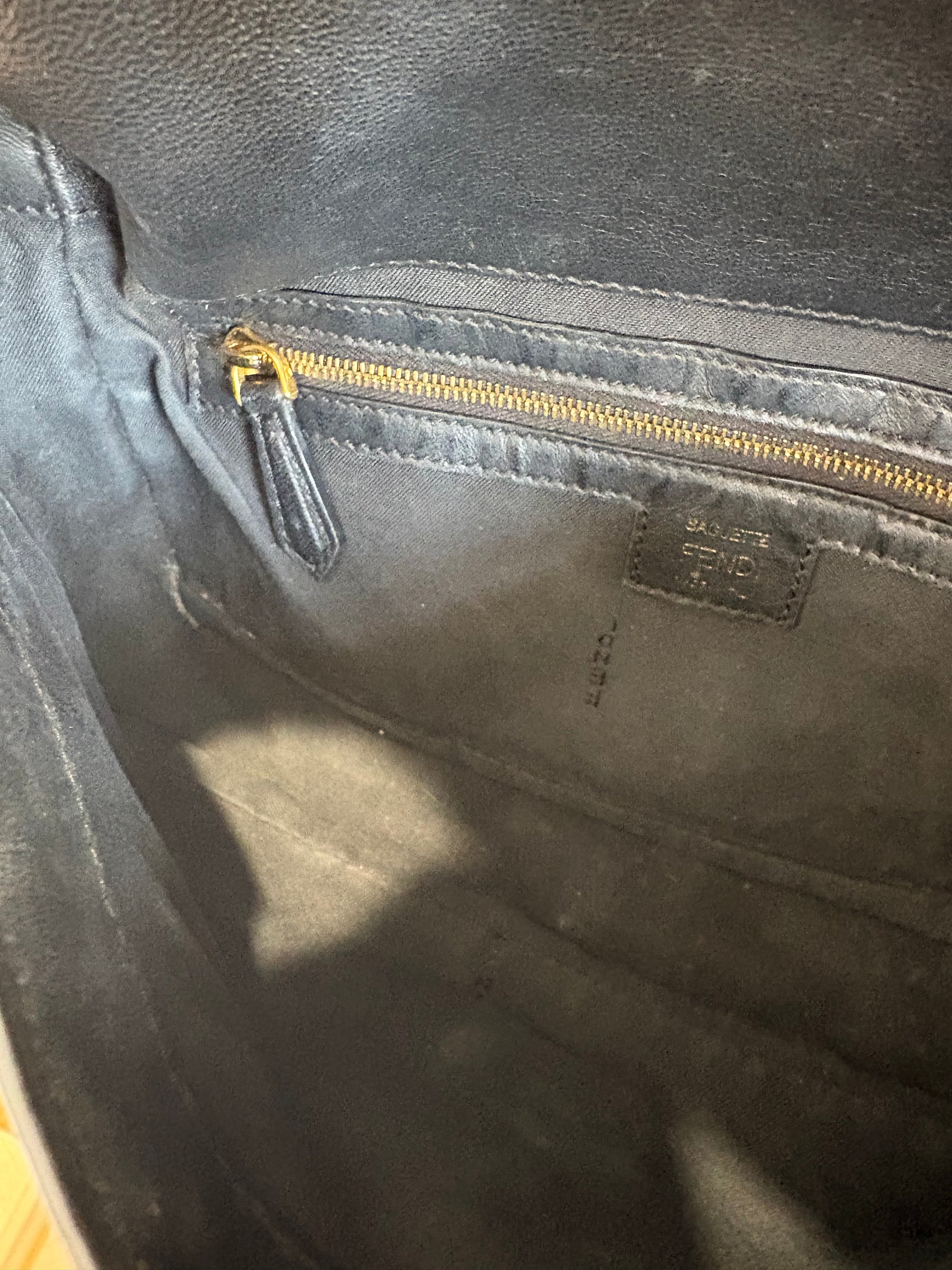 Fendi Black Leather Debossed Monogram Baguette Bag