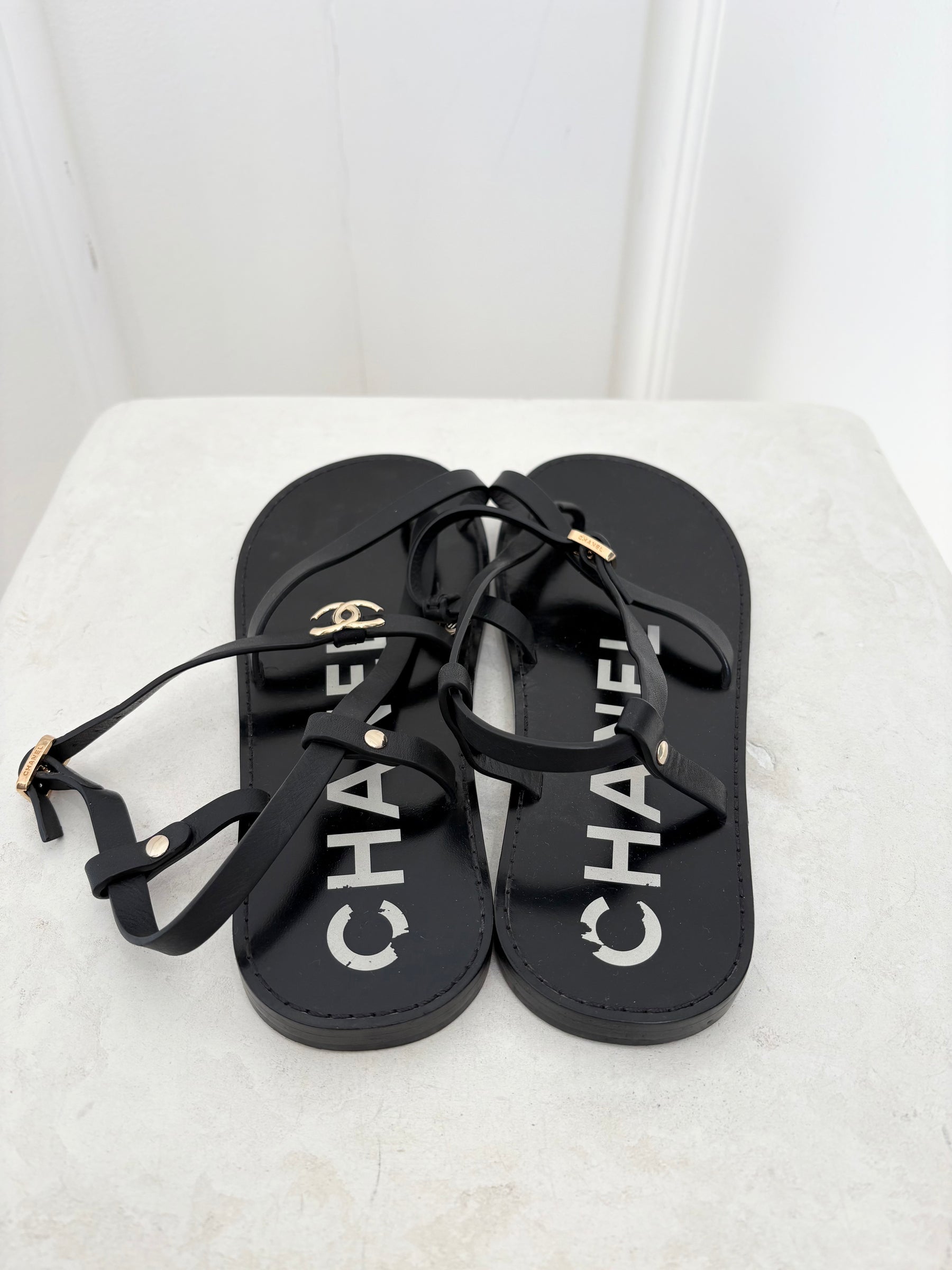 Chanel Black Leather Logo Strappy Sandal, 38