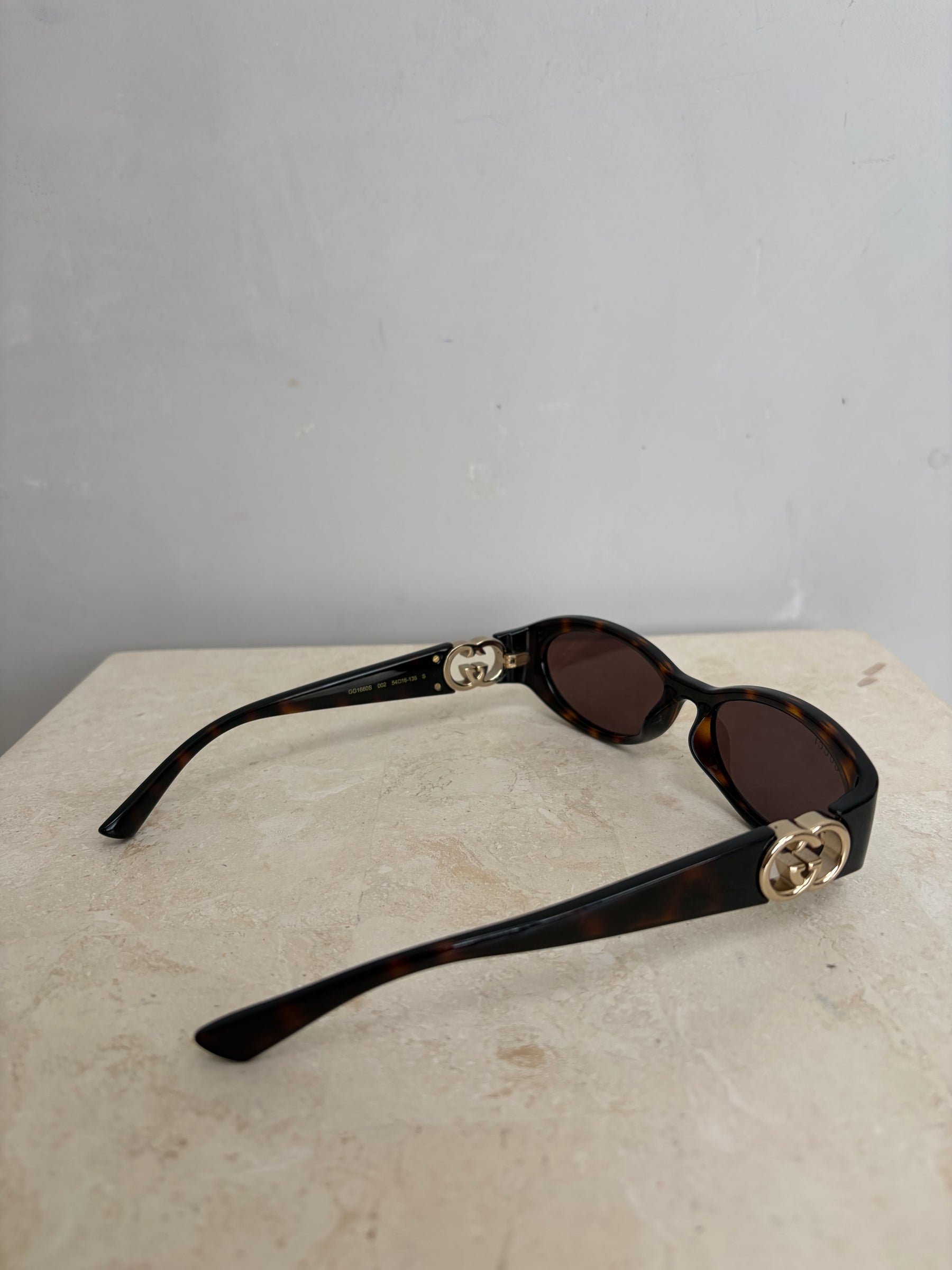 Gucci Tortoiseshell Oval Logo Arm Sunglasses