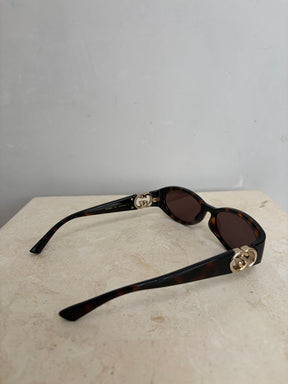 Gucci Tortoiseshell Oval Logo Arm Sunglasses