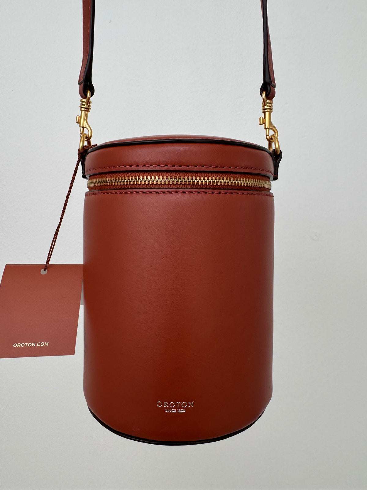 Oroton Iris Drum Bag In Light Rust