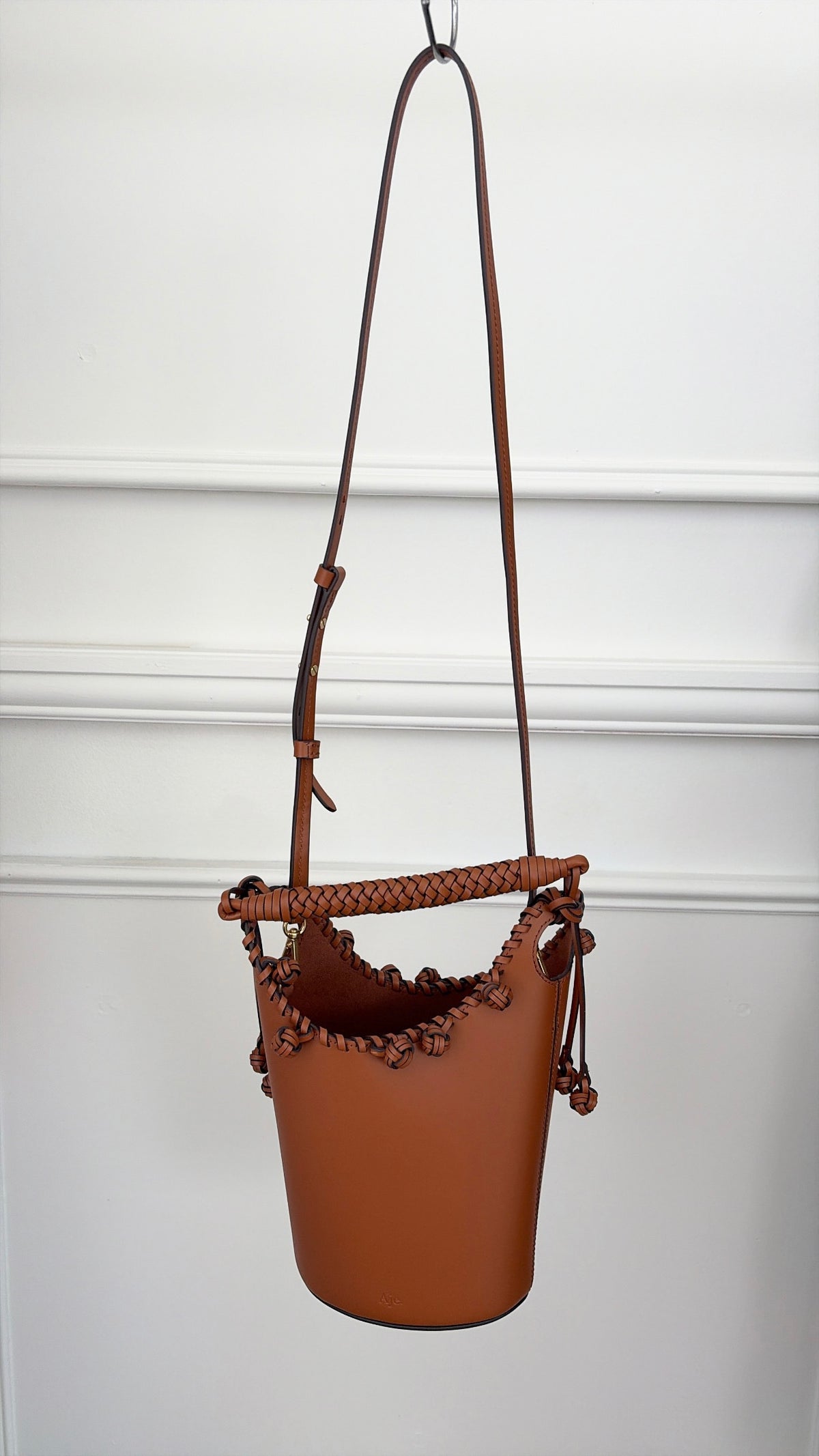 Aje Tan Leather Woven Trim Bucket Bag