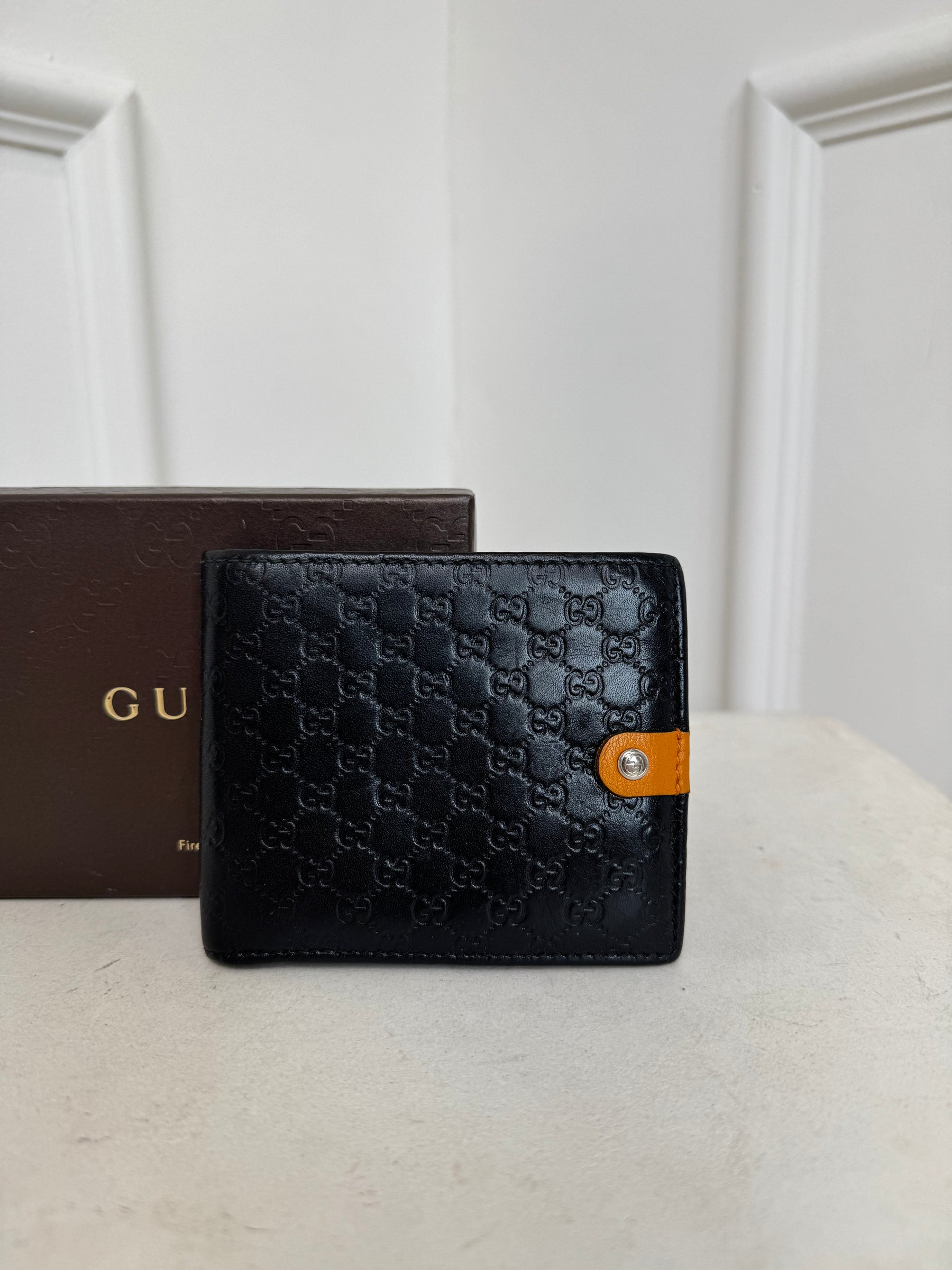 Gucci Black Monogram Embossed Leather Mens Wallet