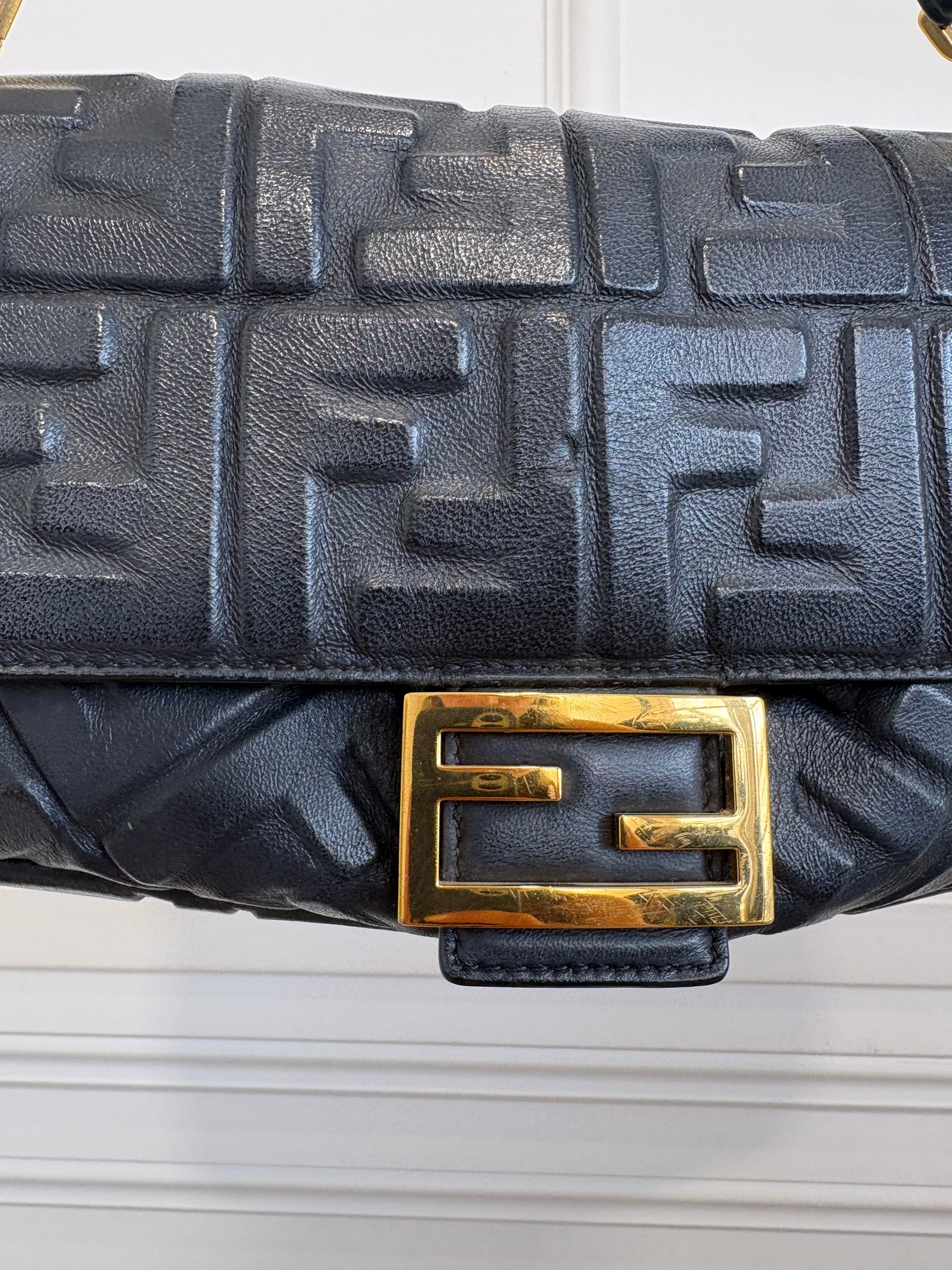 Fendi Black Leather Debossed Monogram Baguette Bag