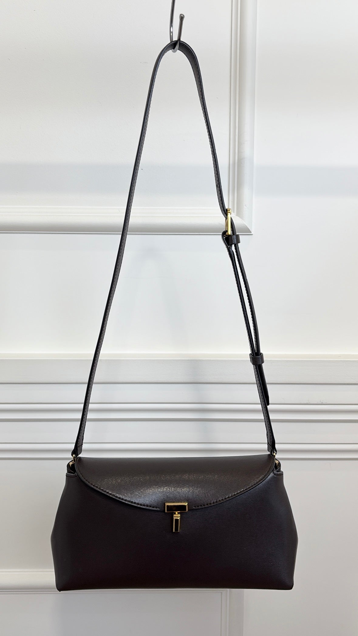 Totême Brown T-Lock Small leather clutch