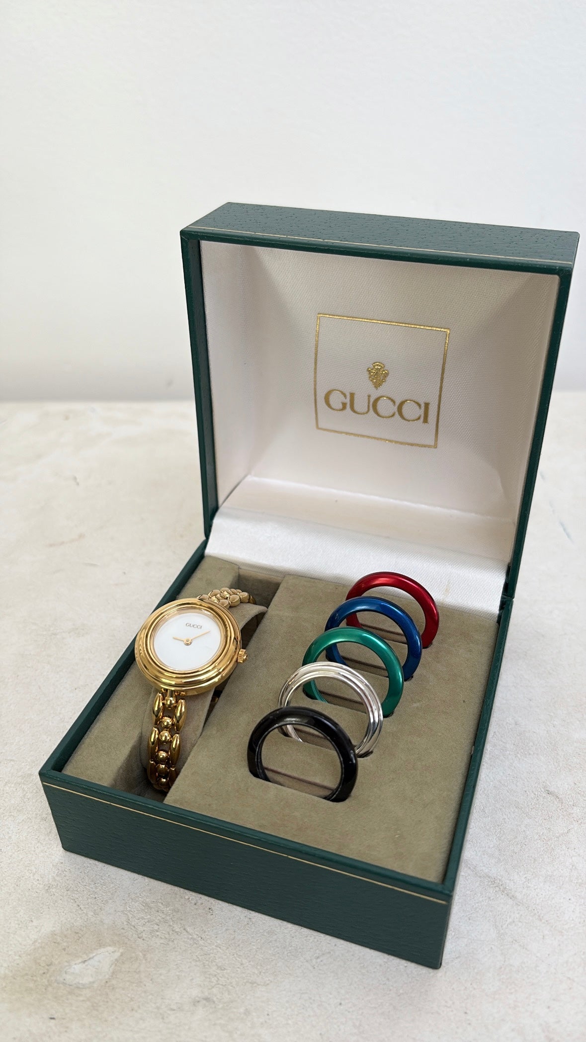 Gucci Gold Tone Interchangeable Bezel Watch