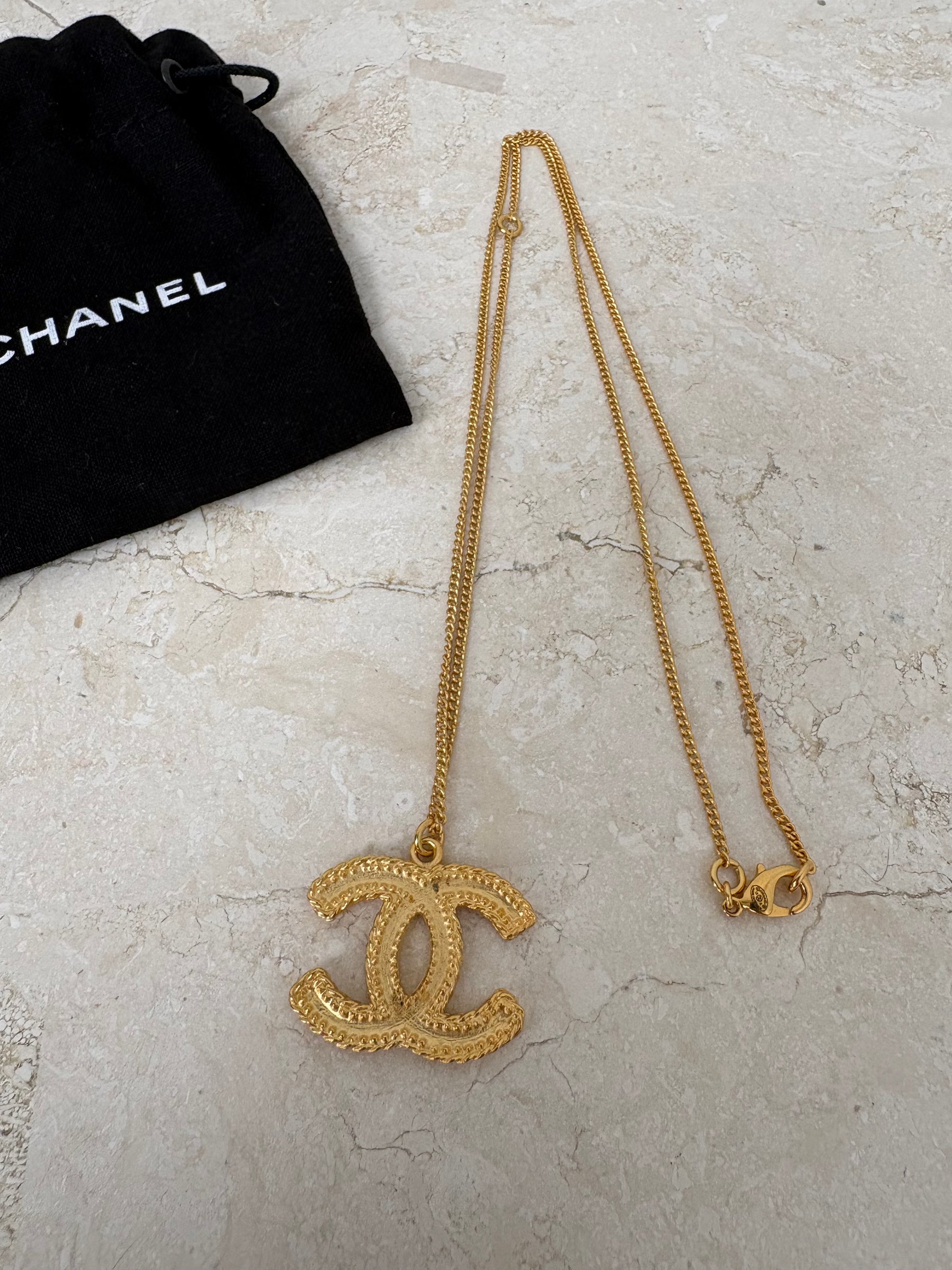 Chanel Gold Tone CC Pendant Necklace