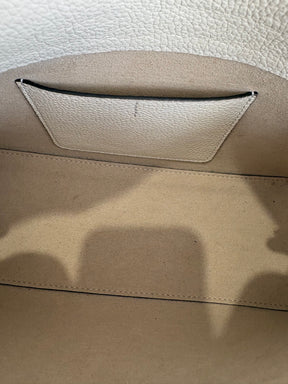 Totême T-Lock Textured Leather Clutch Cream