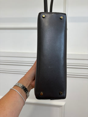Totême Brown T-Lock Small leather clutch