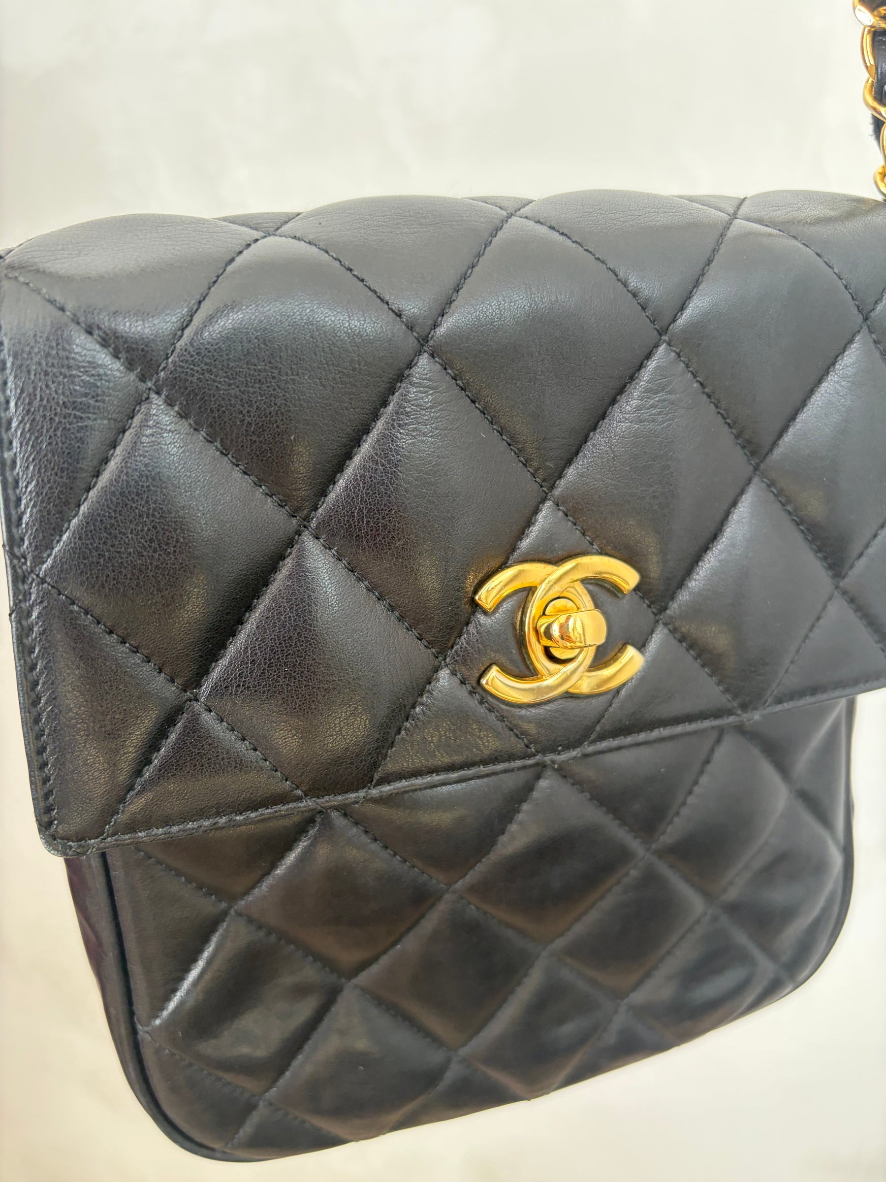 Chanel Black Lambskin Leather Vertical Mini Flap bag