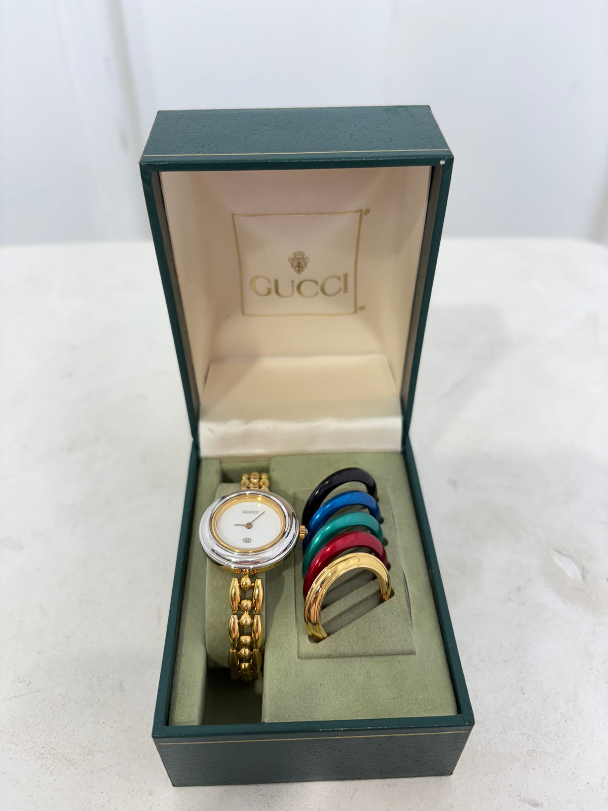 Gucci Gold Tone Round Bracelet Watch with Interchangeable Bezel