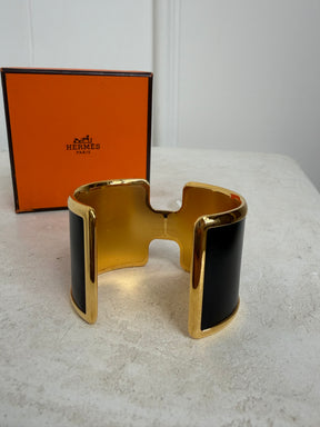 Hermès Black and Gold Leather Olympe cuff bracelet