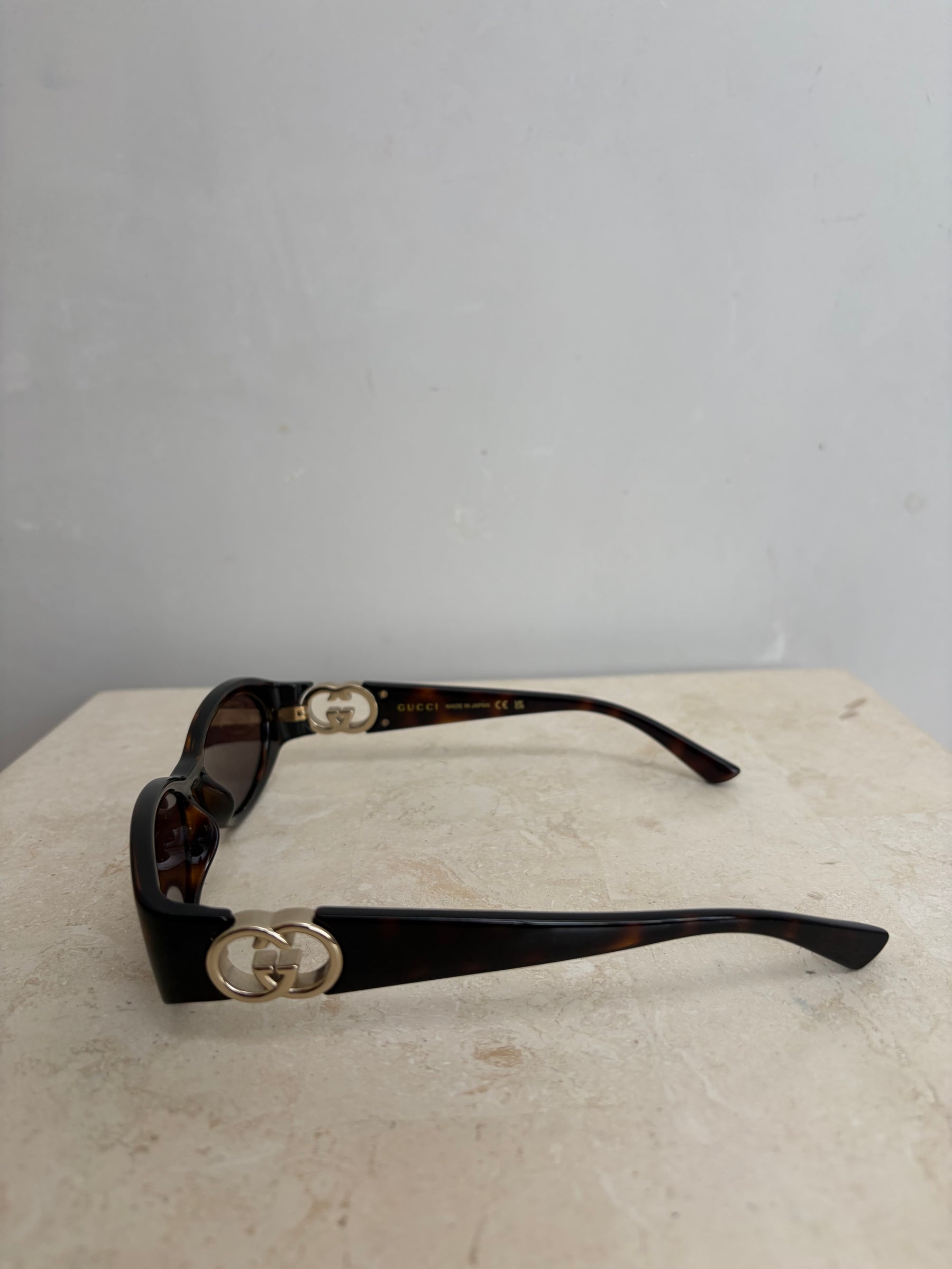 Gucci Tortoiseshell Oval Logo Arm Sunglasses