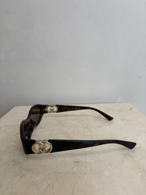 Gucci Tortoiseshell Oval Logo Arm Sunglasses