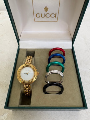 Gucci Gold Tone Interchangeable Bezel Watch