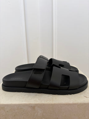 Hermès Black Leather Chypre Sandals, 38.5