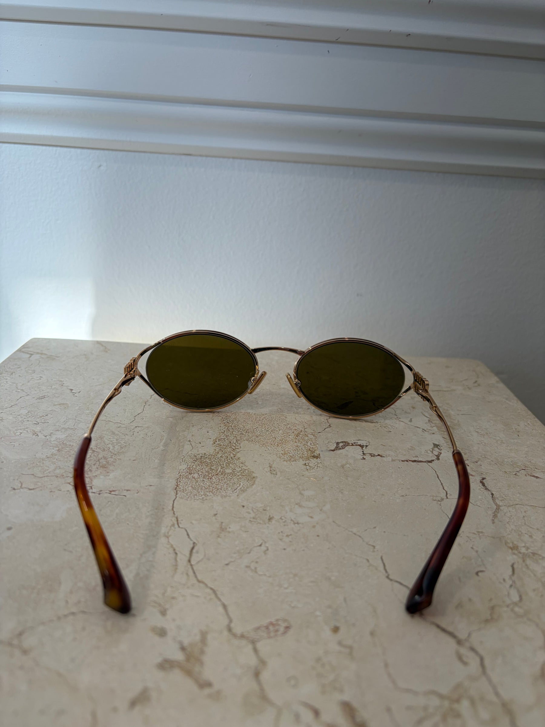Miu Miu Logo Oval Sunglasses Gold