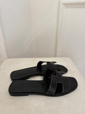 Hermès Black LEather Oran Sandals, 38