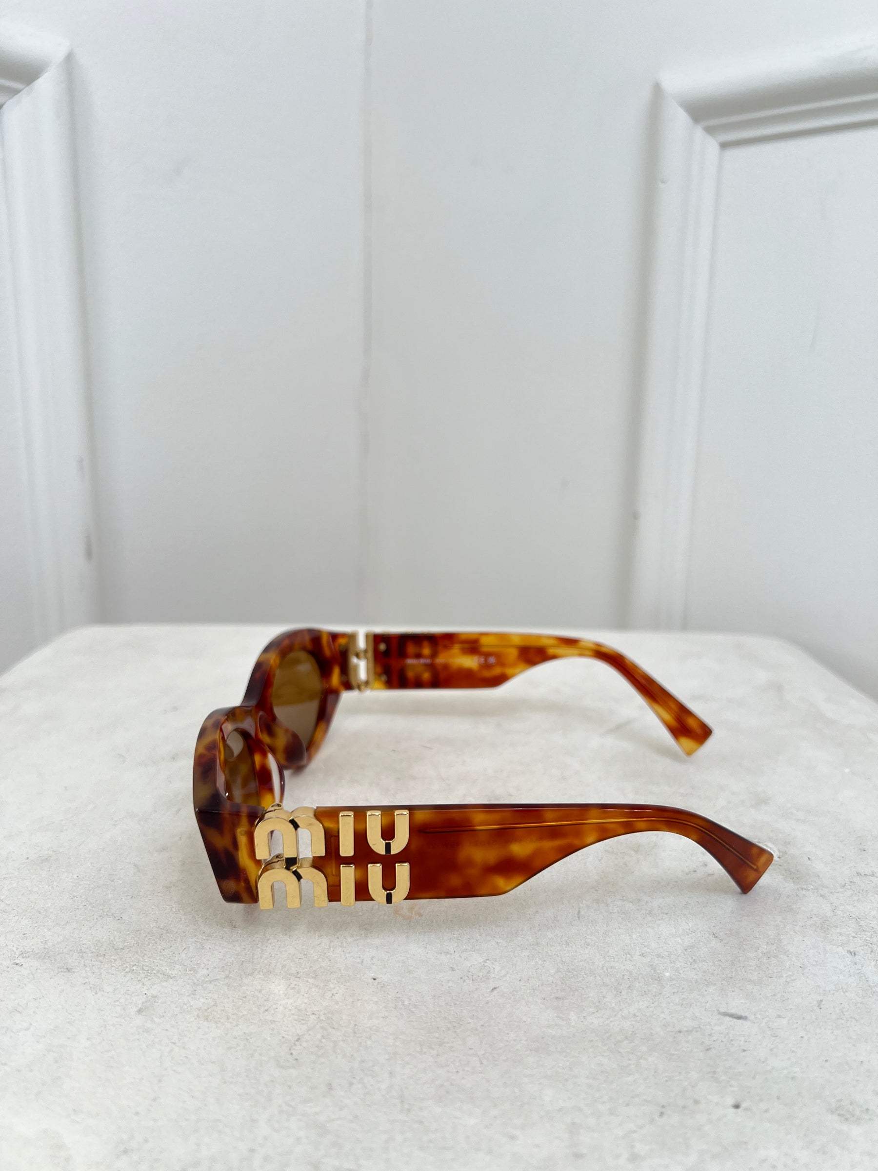 Miu Miu Tortoiseshell Oval Logo Arm Sunglasses