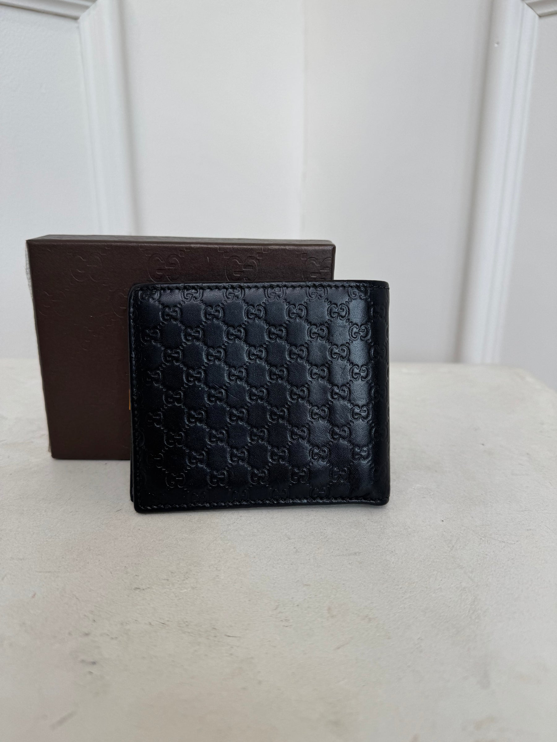 Gucci Black Monogram Embossed Leather Mens Wallet