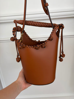 Aje Tan Leather Woven Trim Bucket Bag