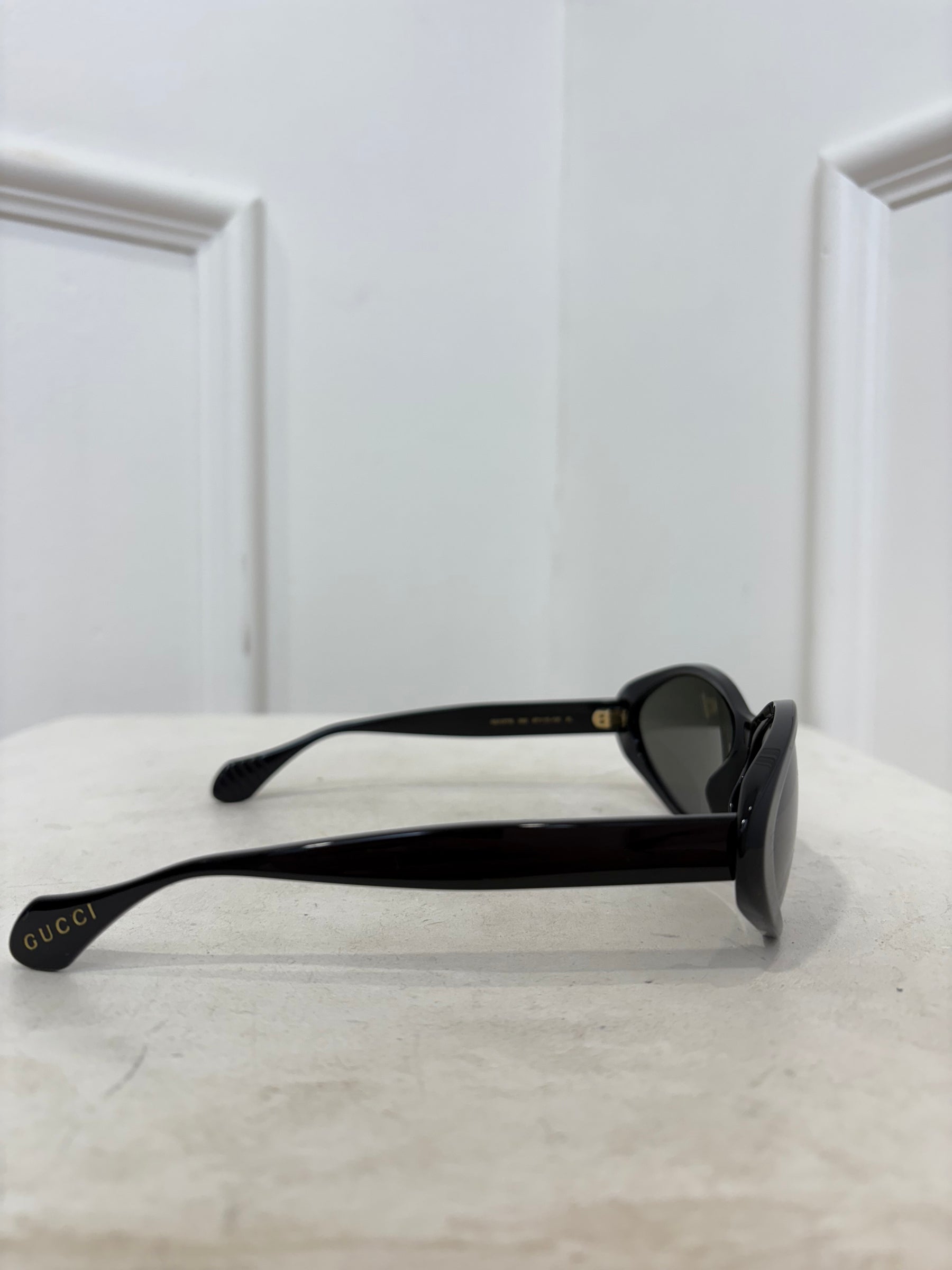 Gucci Black Pointed Oval Sunglasses
