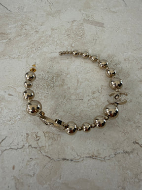 Chanel Gold Tone Ball Logo Hoops