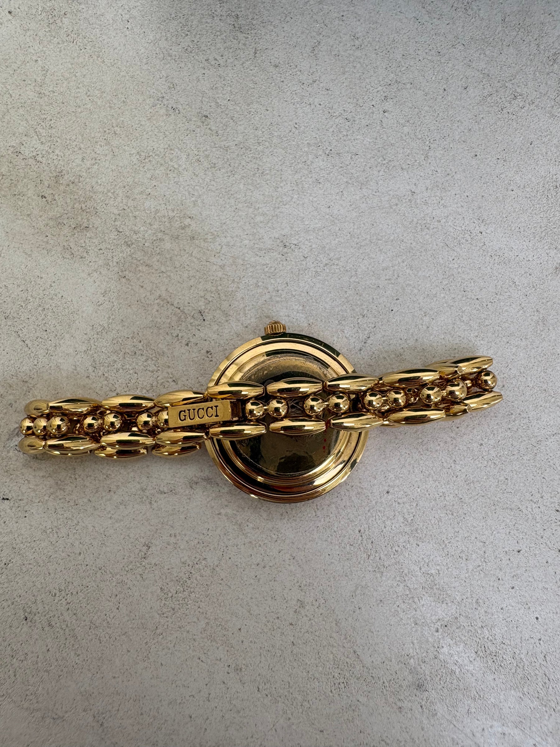 Gucci Gold Tone Interchangeable Bezel Watch