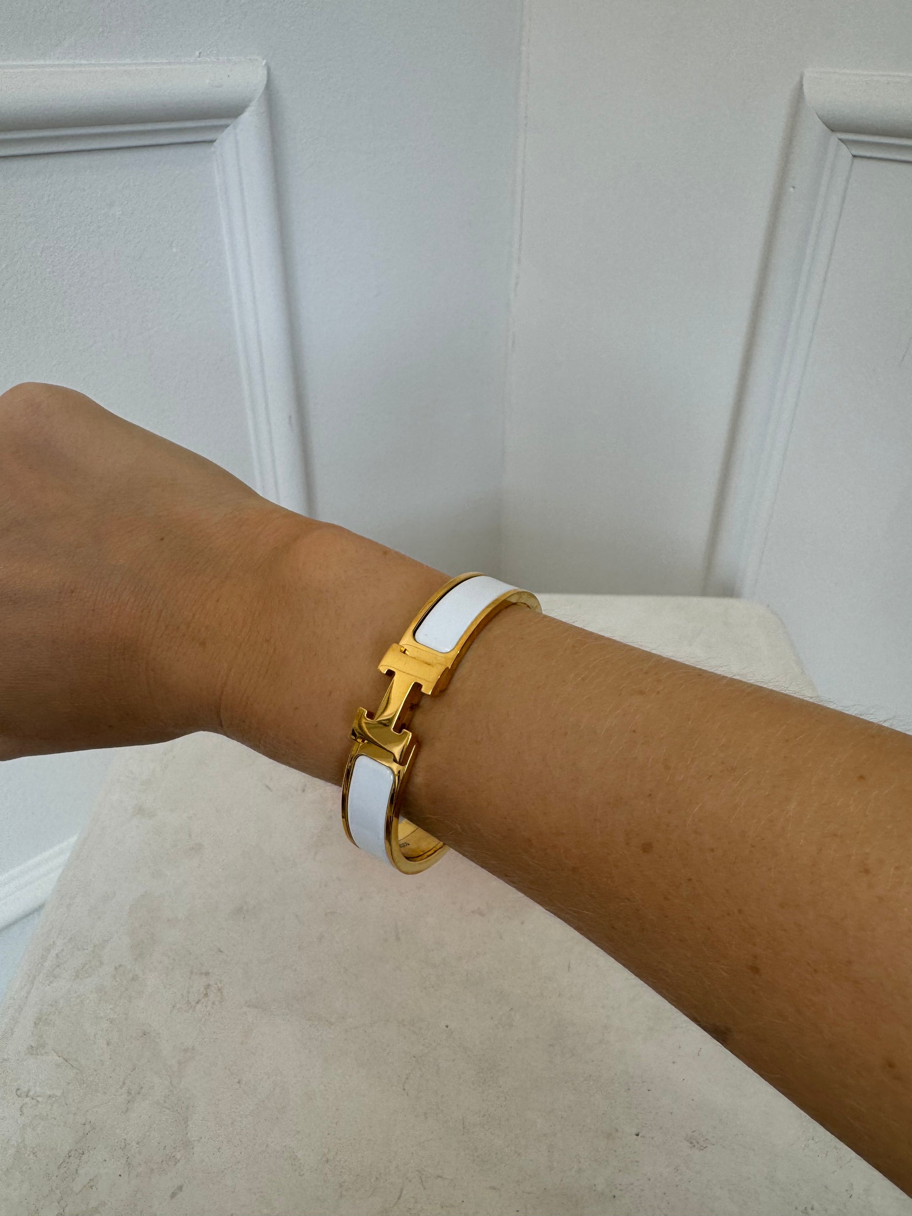 Hermès Gold Tone and White Enamel Clic H bangle