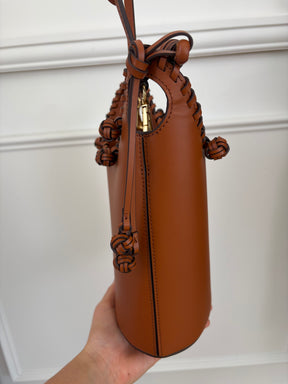 Aje Tan Leather Woven Trim Bucket Bag