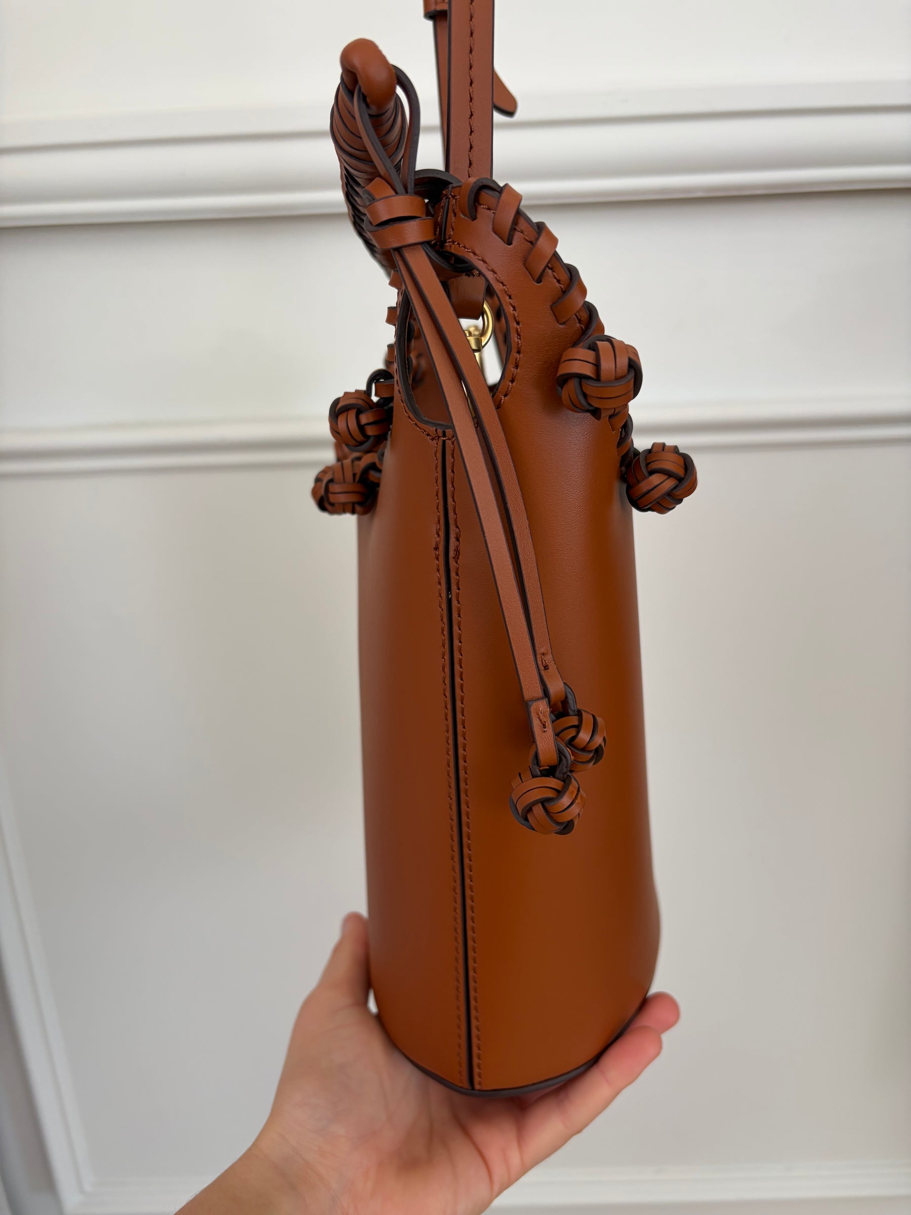 Aje Tan Leather Woven Trim Bucket Bag