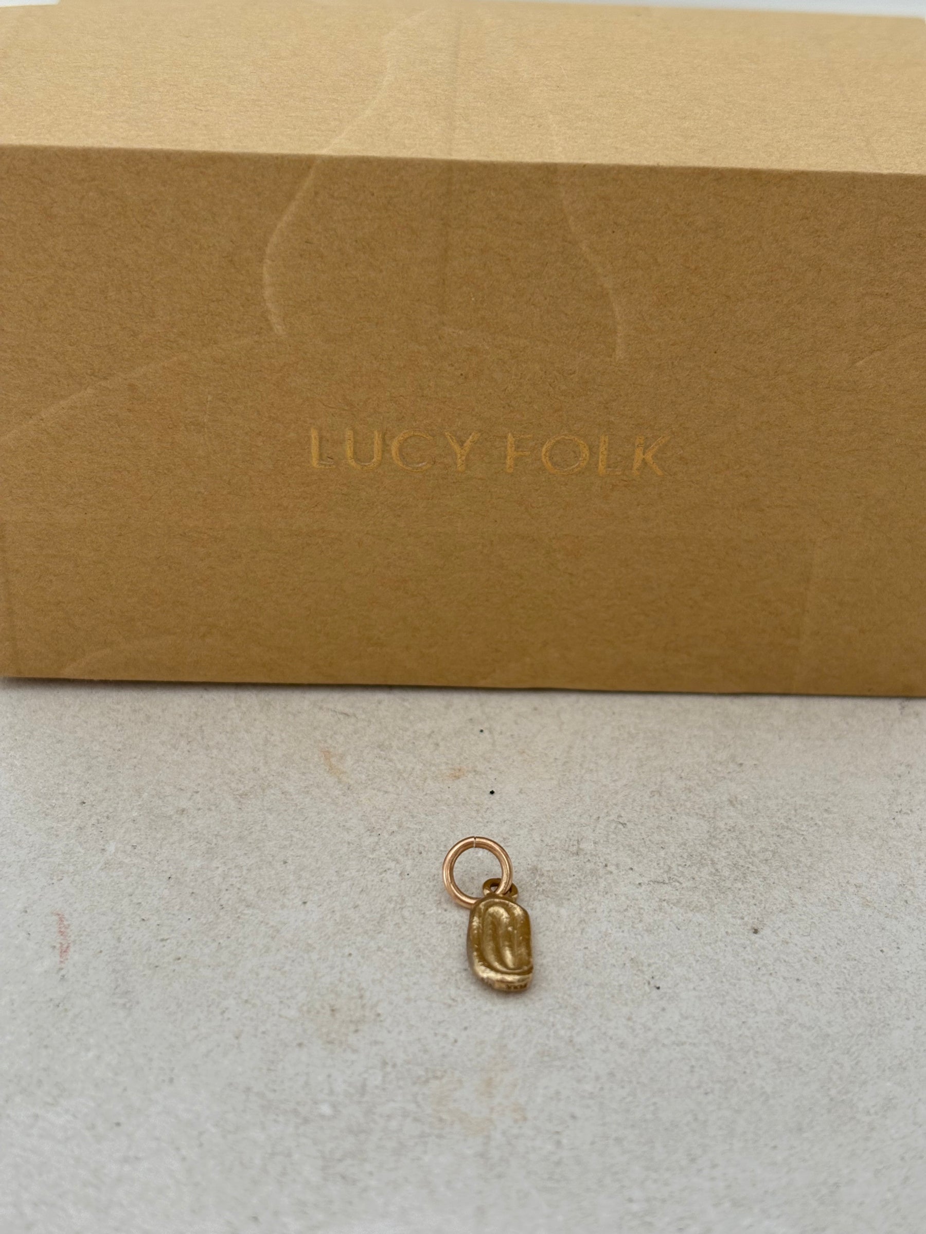 Lucy Folk 9k Gold Draa Charm