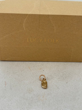 Lucy Folk 9k Gold Draa Charm