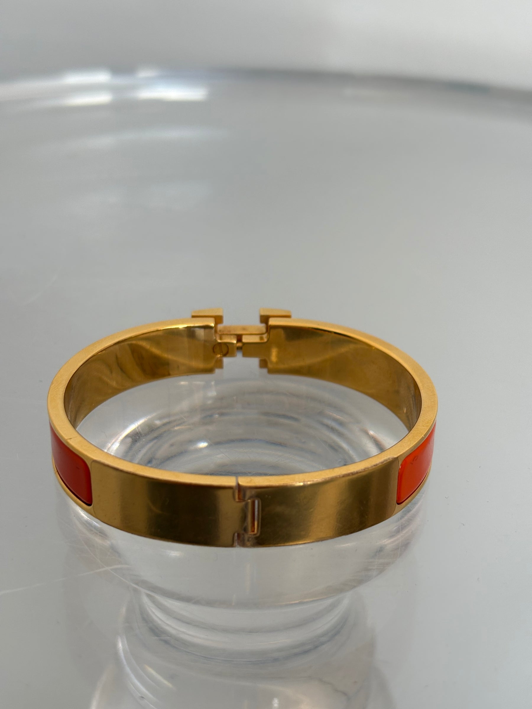 Hermès Orange and Gold Clic H Bracelet