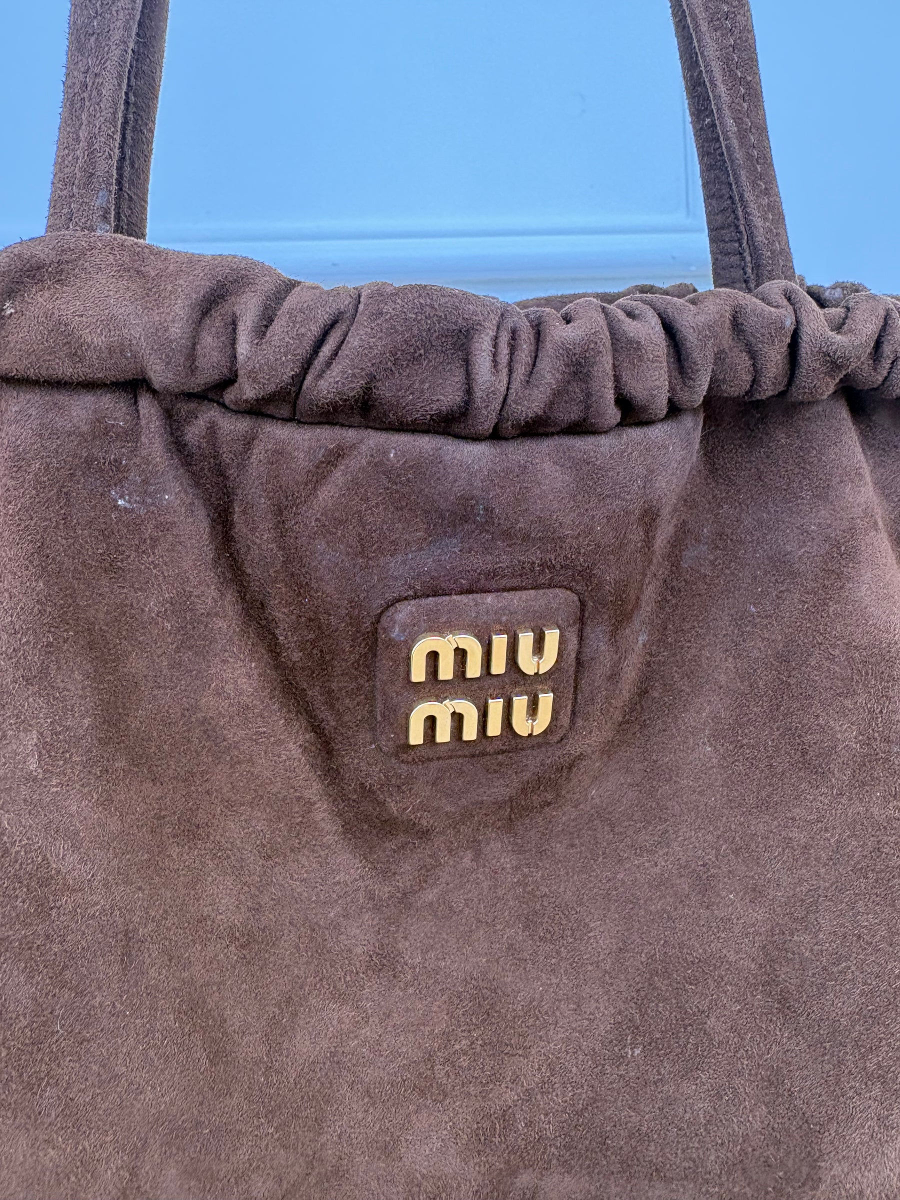 Miu Miu Suede Drawstring Bag In Chocolate