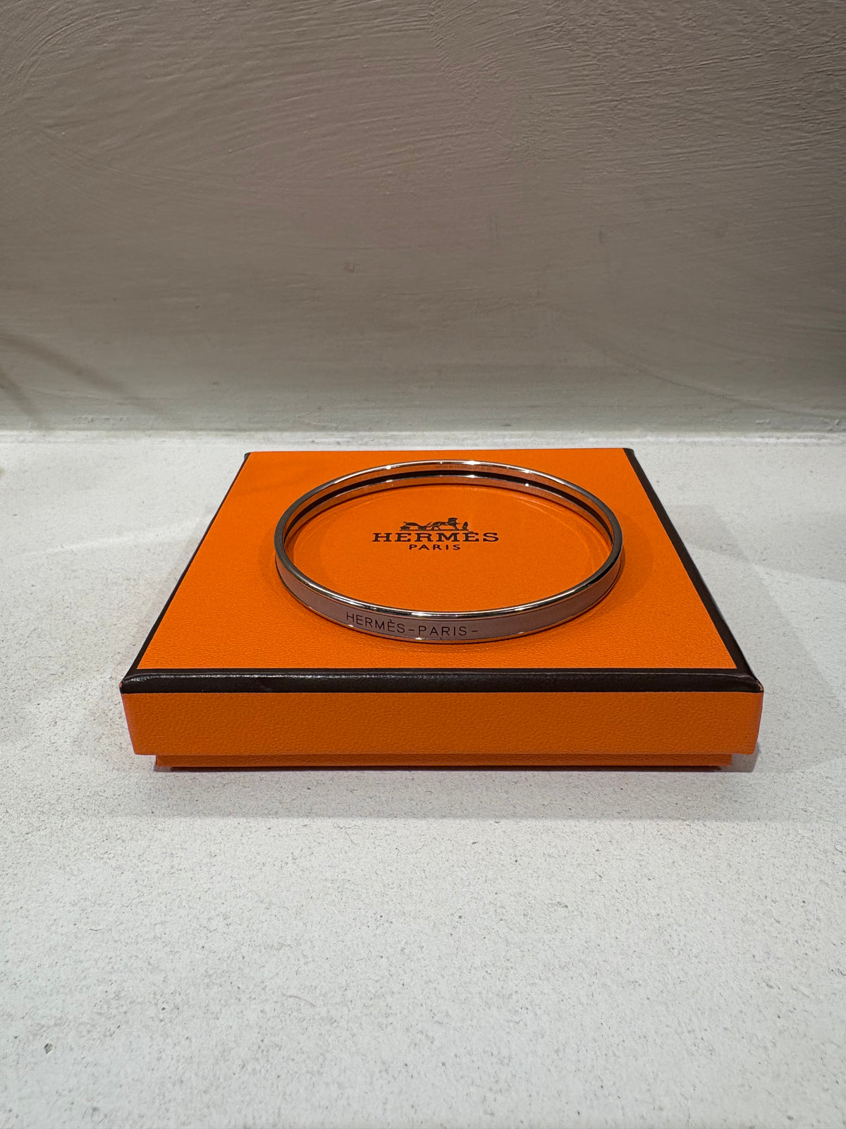 Hermès Silver and Grey Enamel Logo Bangle, 65