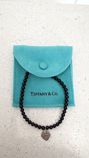 Tiffany & Co. Onyx and Silver Heart Charm Bracelet